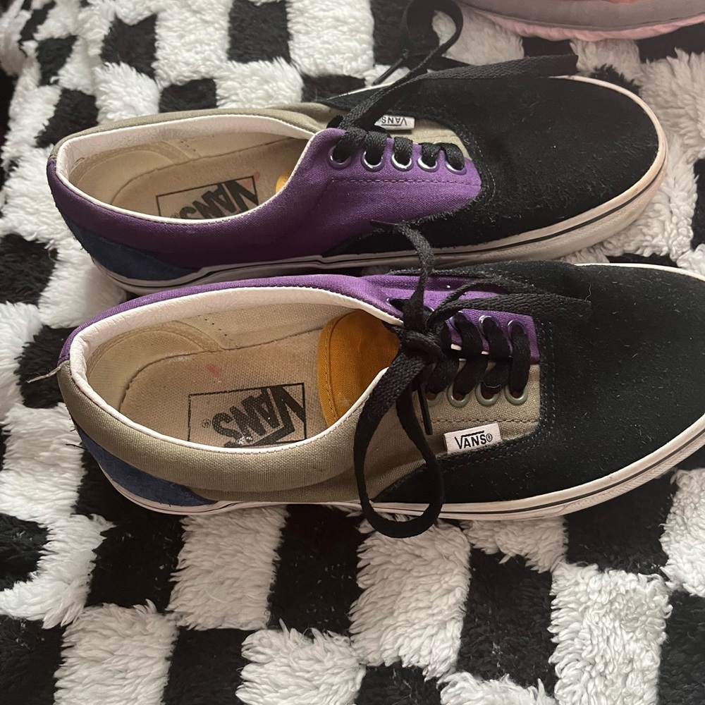 Size 8 women’s canvas multi colored vans. Only worn a few times.